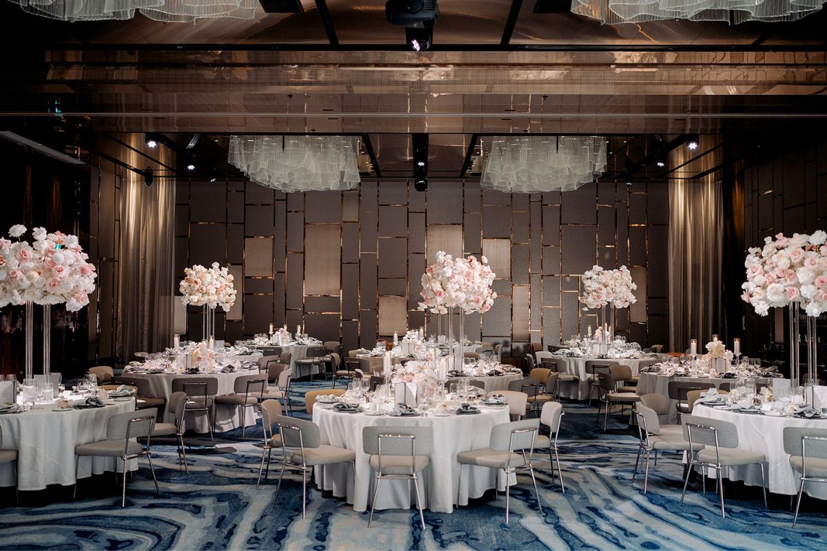 Tables set for dinner in the Pearl Ballroom at Crown Sydney